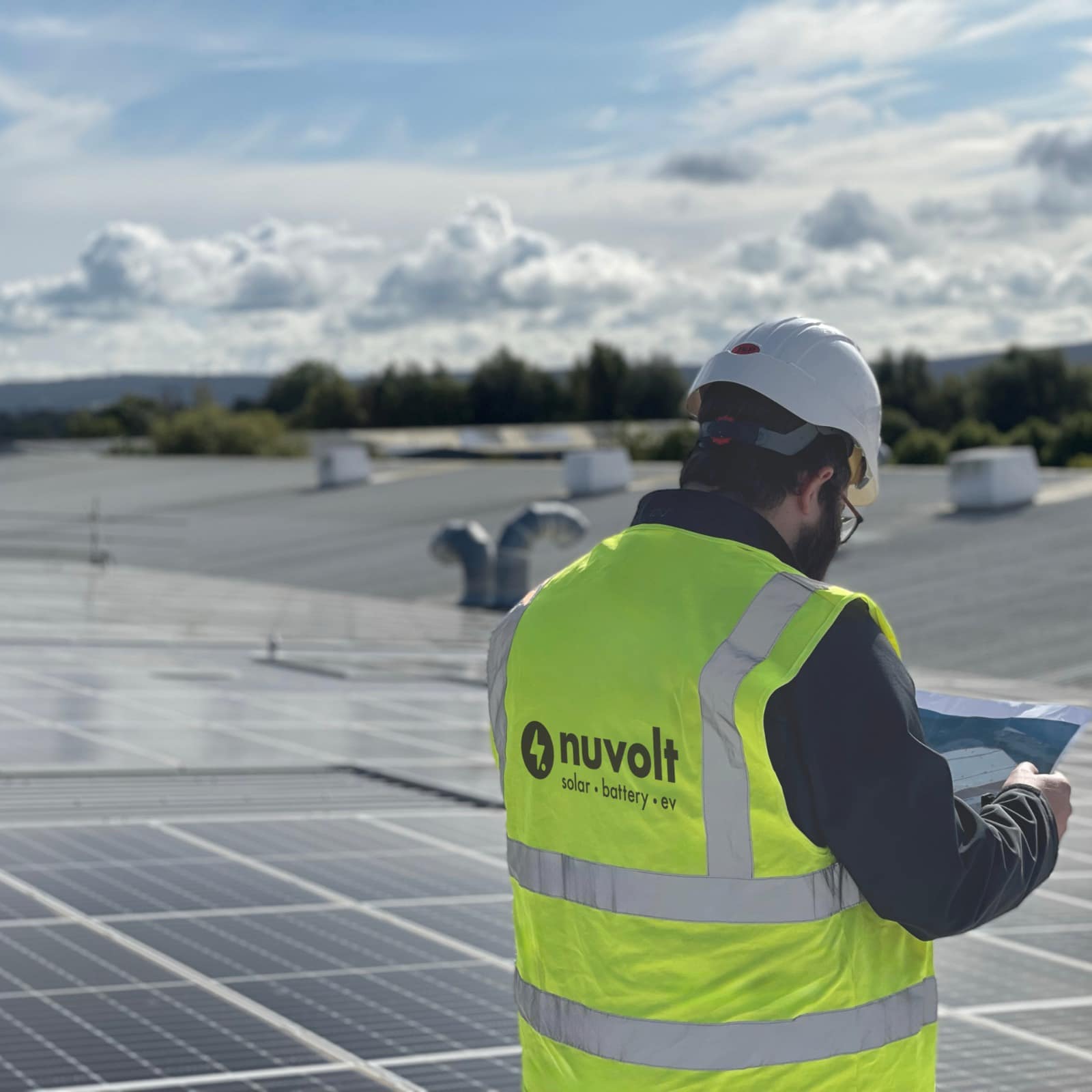 Nuvolt engineers on a commercial rooftop